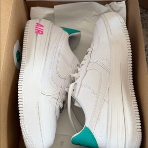 Nike White Sneakers with Pink and Blue Highlights